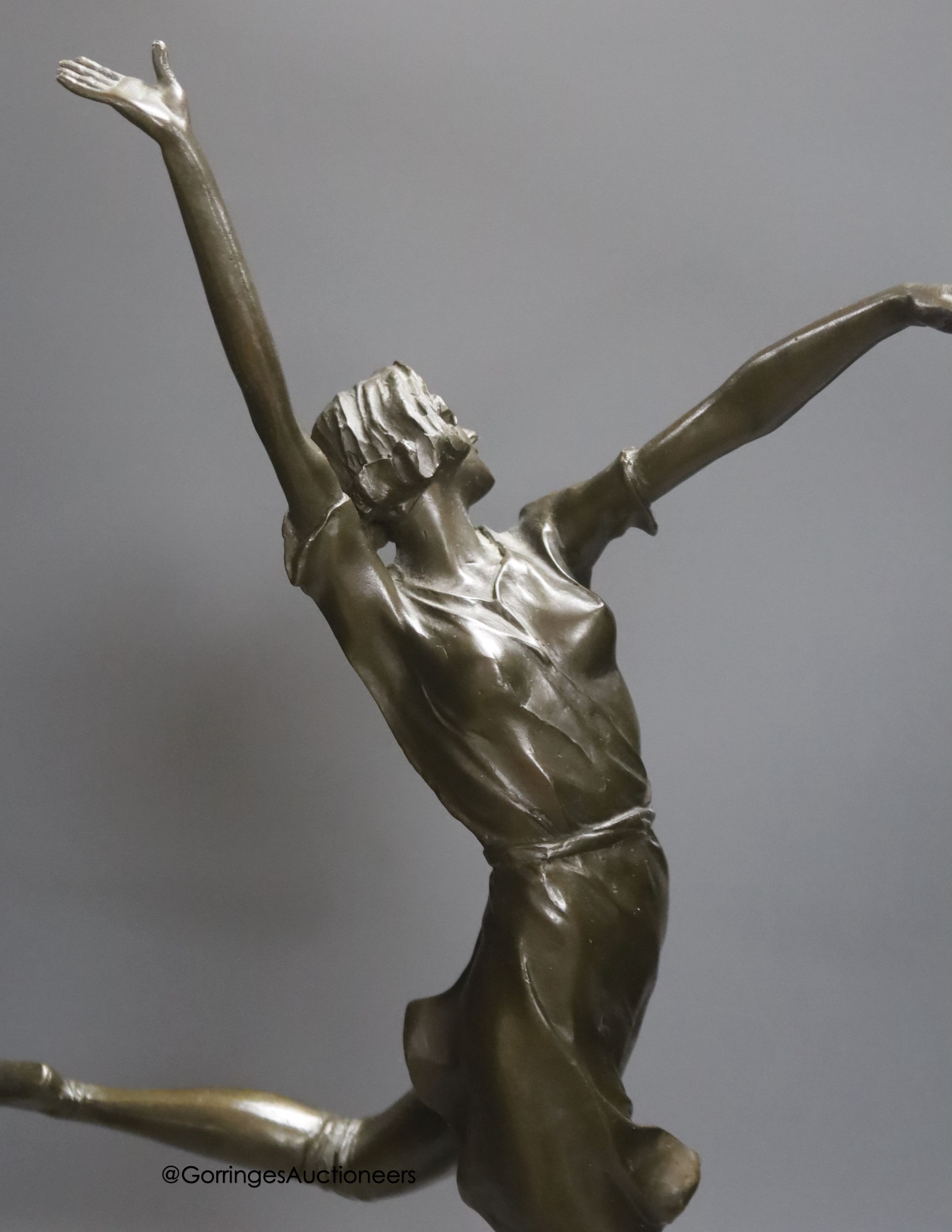 After B. Zach. An Art Deco style bronze figure modelled as a dancer, on a marble base, overall height 65cm